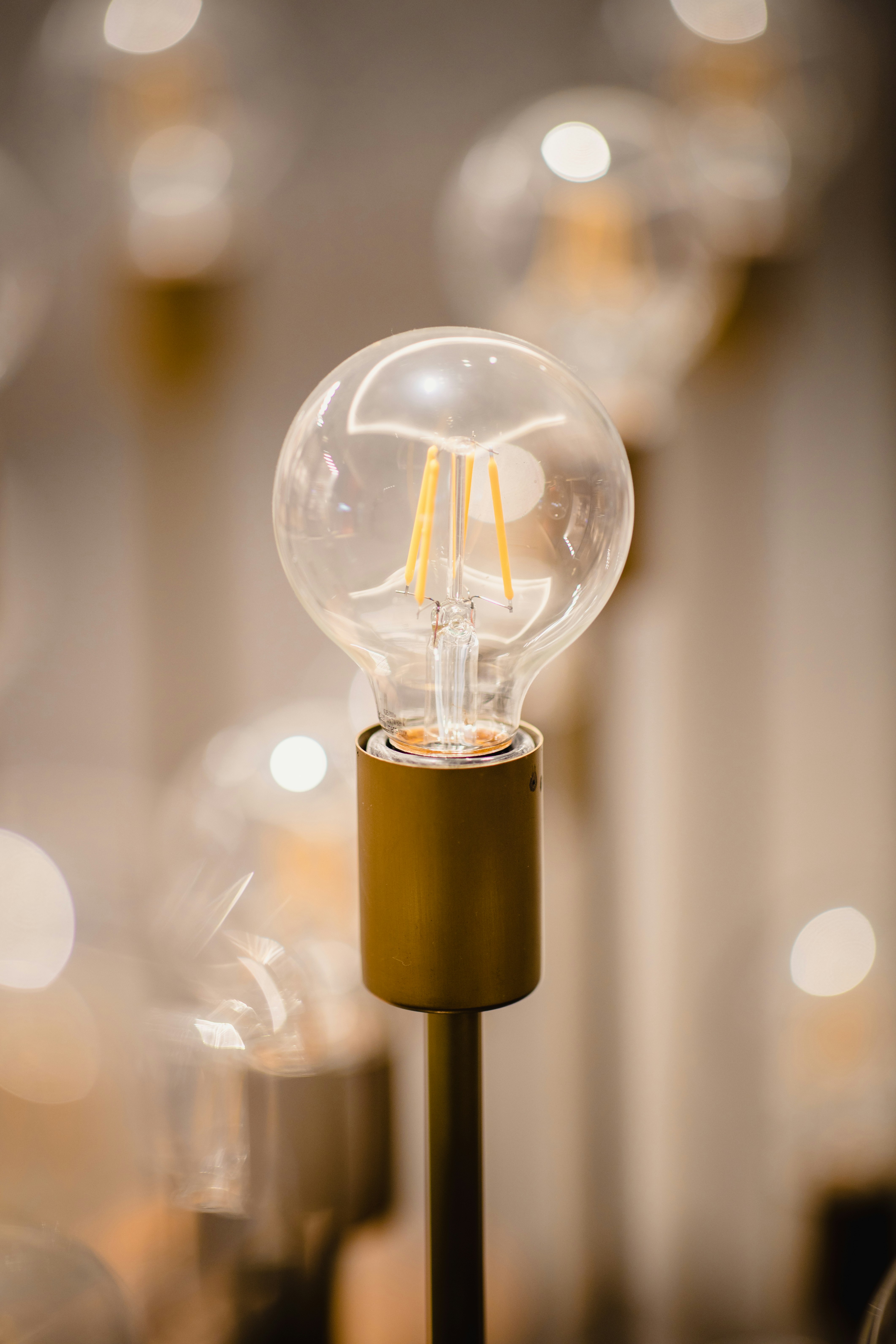 clear glass ball with brown wooden stand